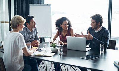 Shot of a group of coworkers in a boardroom meeting - stock photo ...