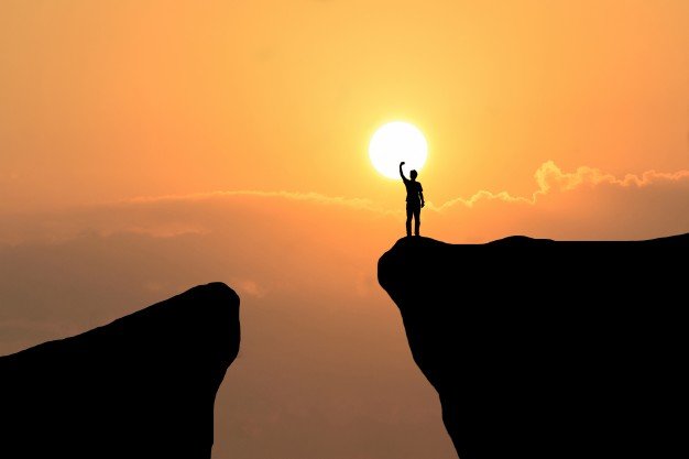 Man on top of mountain ,freedom man on sunset background | Free Photo
